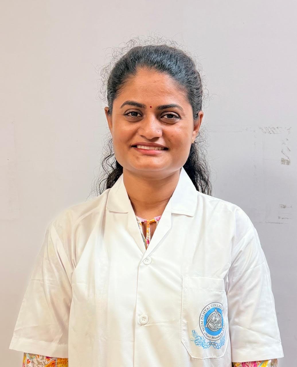 Dr. Munitha Naik